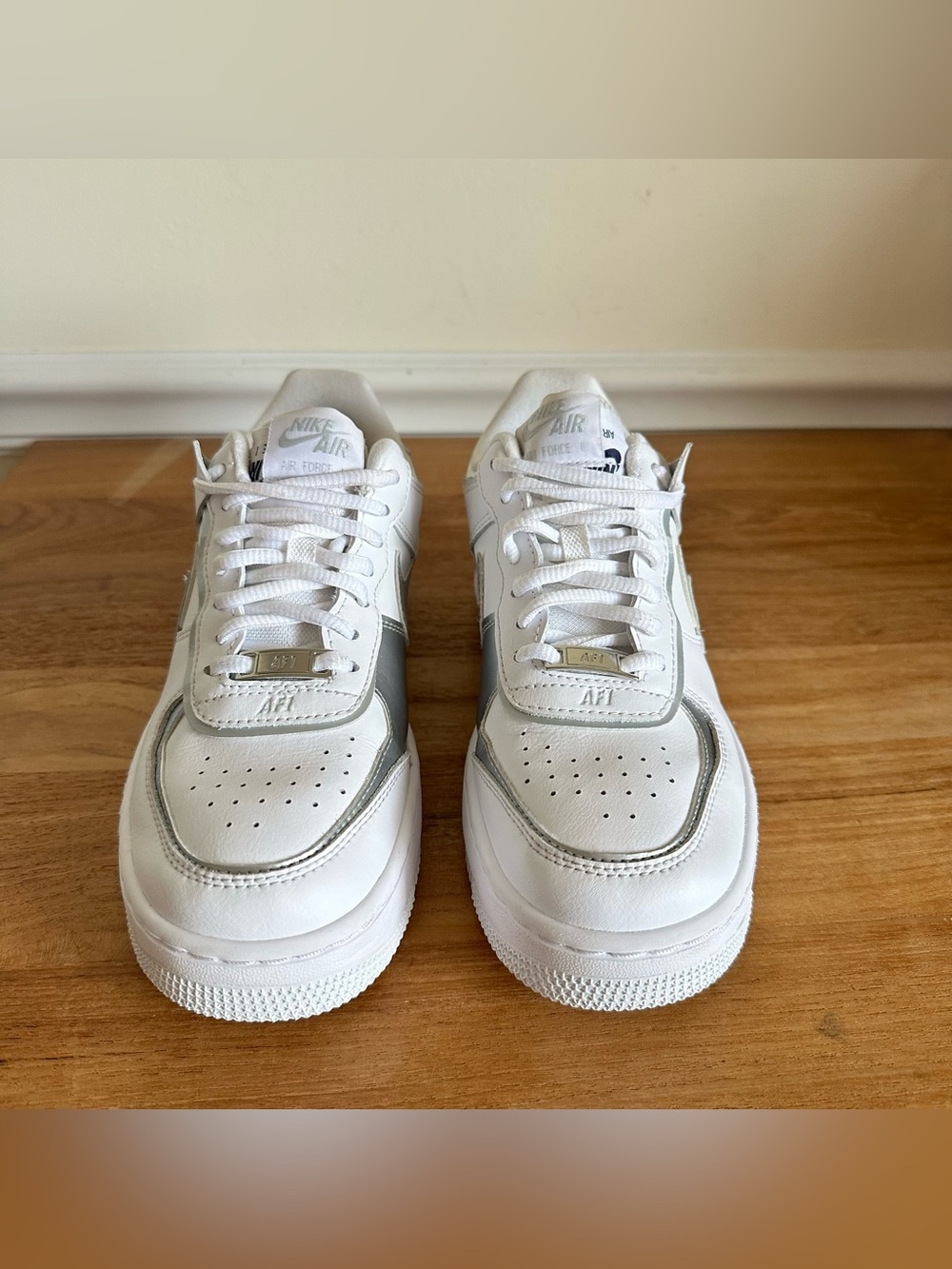 Nike White Sneakers with Metallic Silver Swoosh - Picture 3 of 11